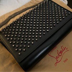 An authentic christian louboutin black Paloma clutch